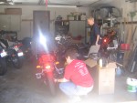 Lark and Bri putting air in my tires before I left.